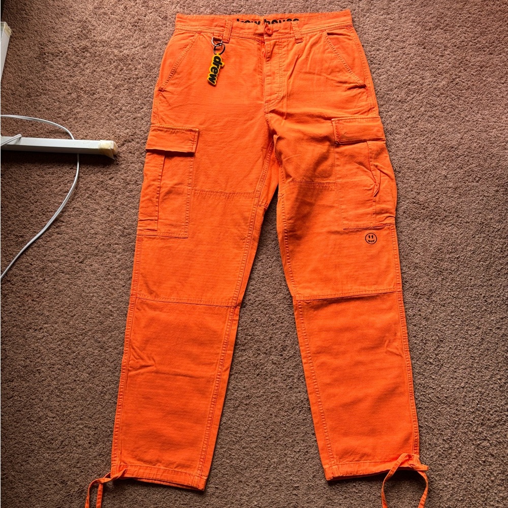 Drew House Orange Cargo Pants with Bold Style and keychain worn a few times